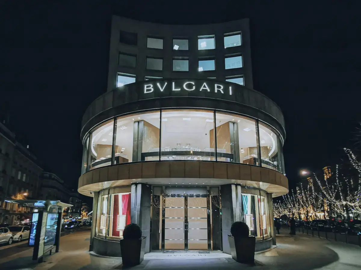 The exterior of a Bulgari boutique with its distinctive storefront, logo, and luxury retail design elements, representing high-value brand protection work